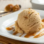 creamy homemade dulce de leche ice cream in vintage bowl