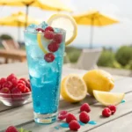 Blue raspberry lemonade with lemon slices and mint close-up